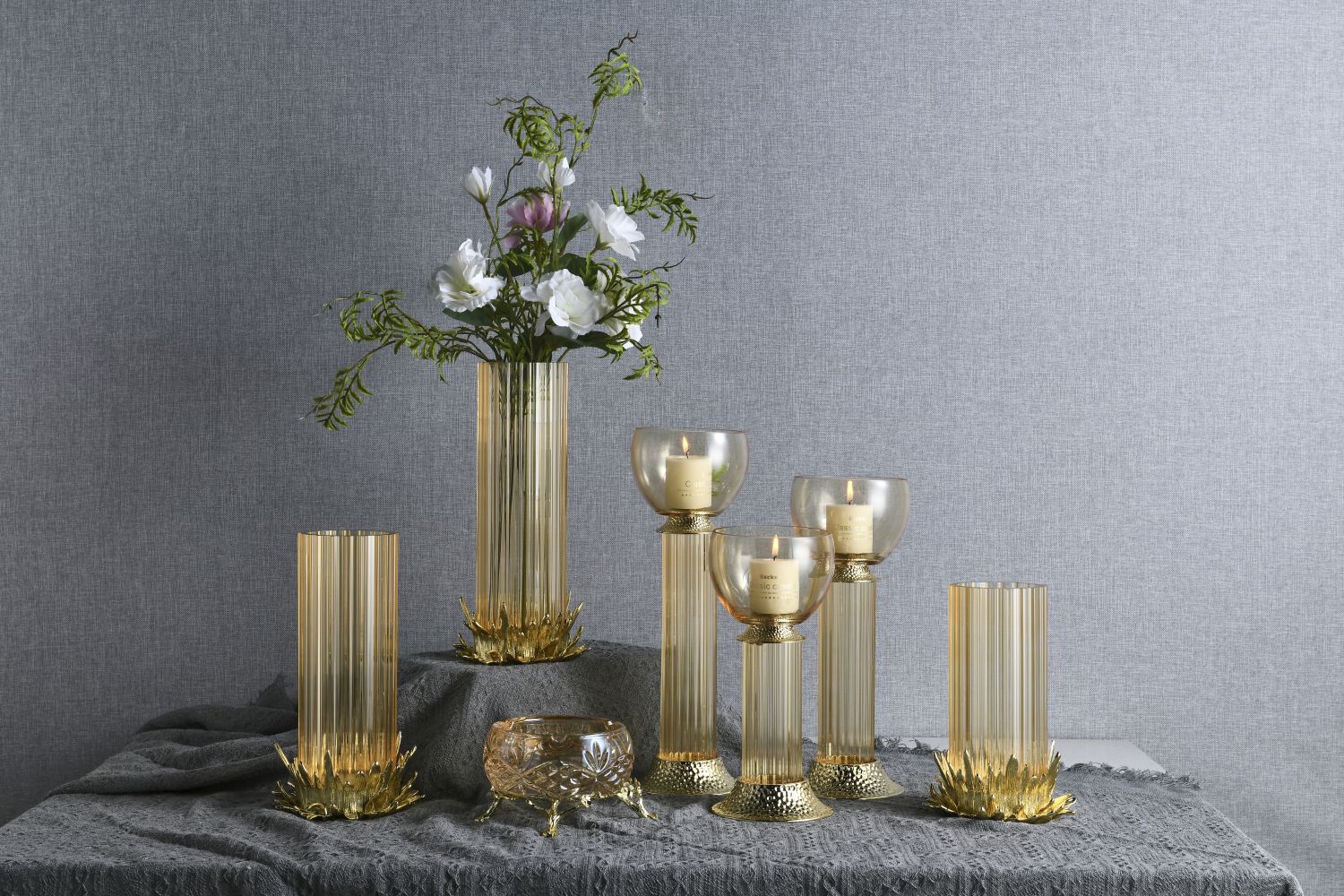 Golden Glass Vases and Candle Holders: A Blend of Simplicity and Elegance