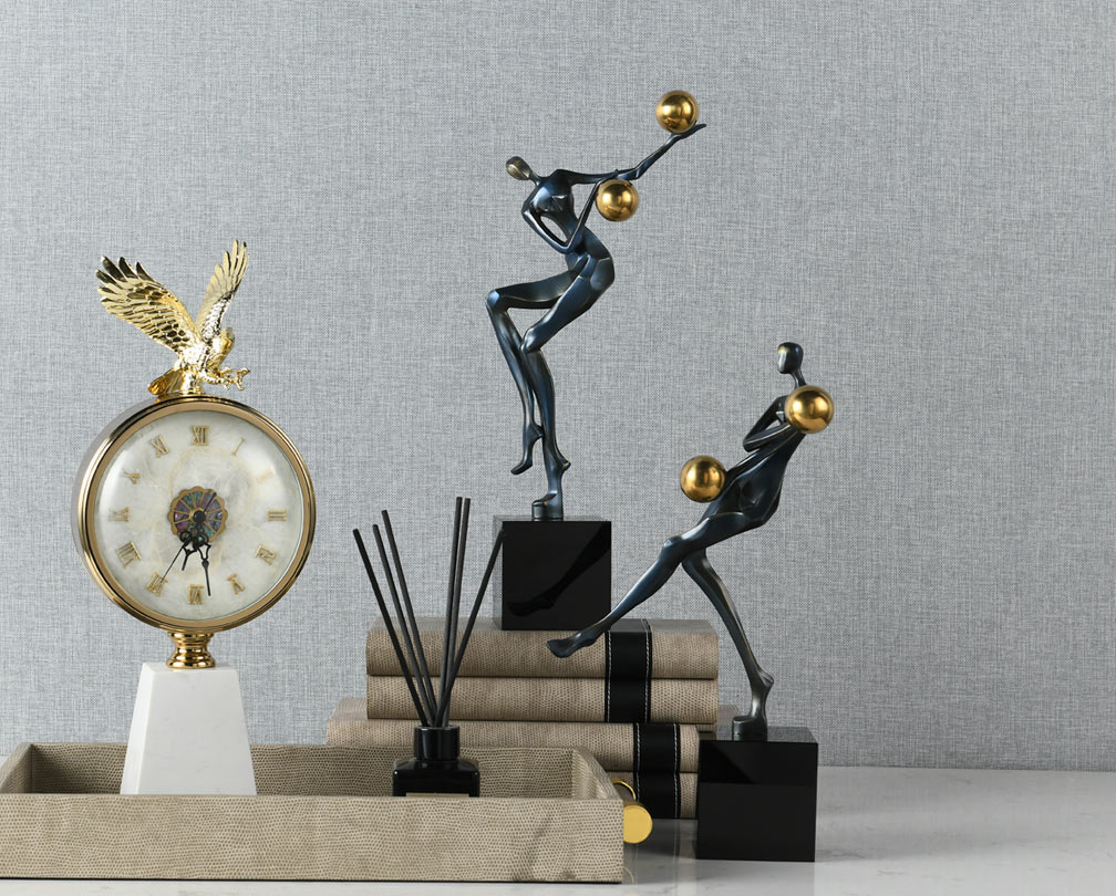 Acrobatic figure sculpture